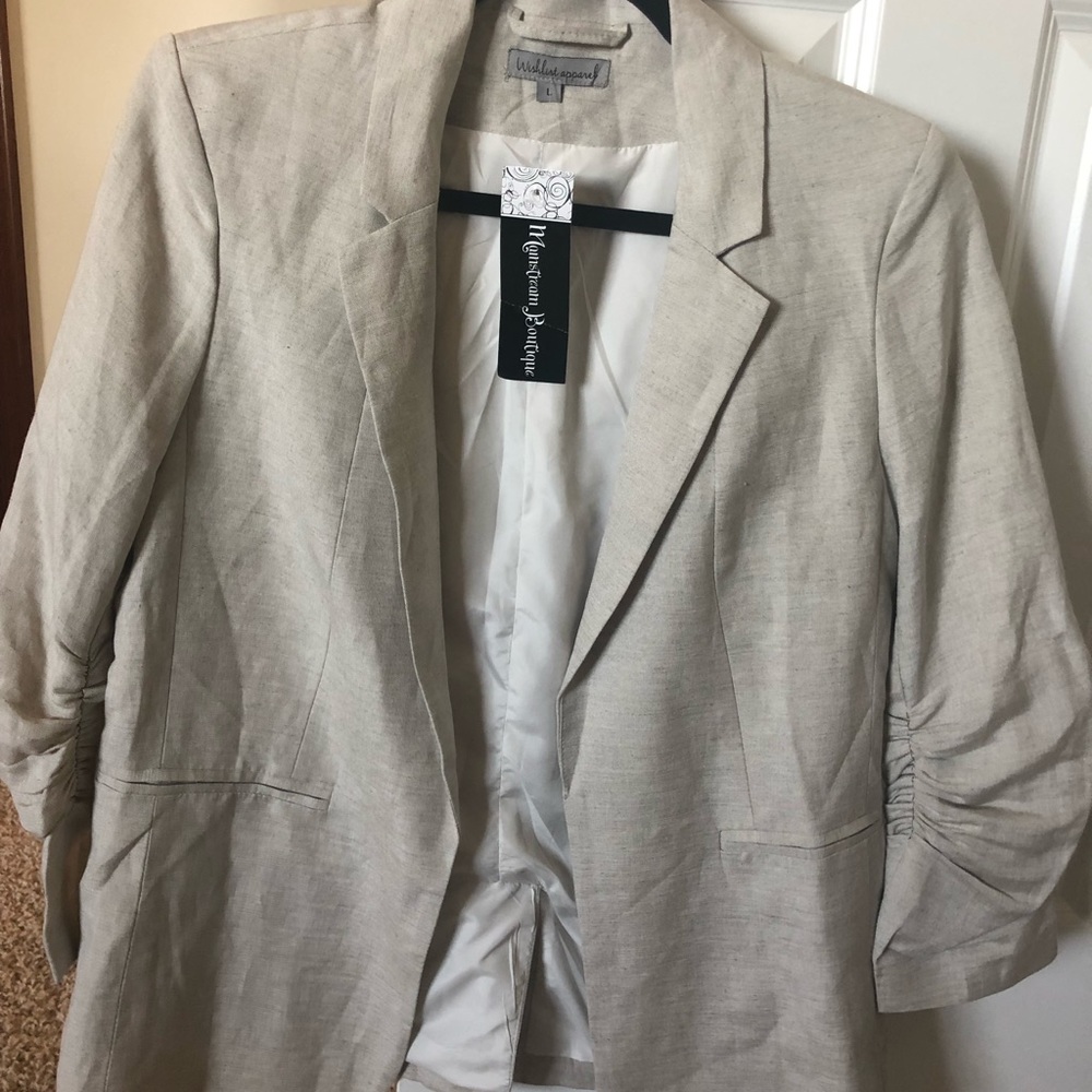 Brand new with tags boutique blazer.